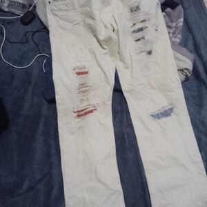 Distressed White Jeans with Red and Blue Accents